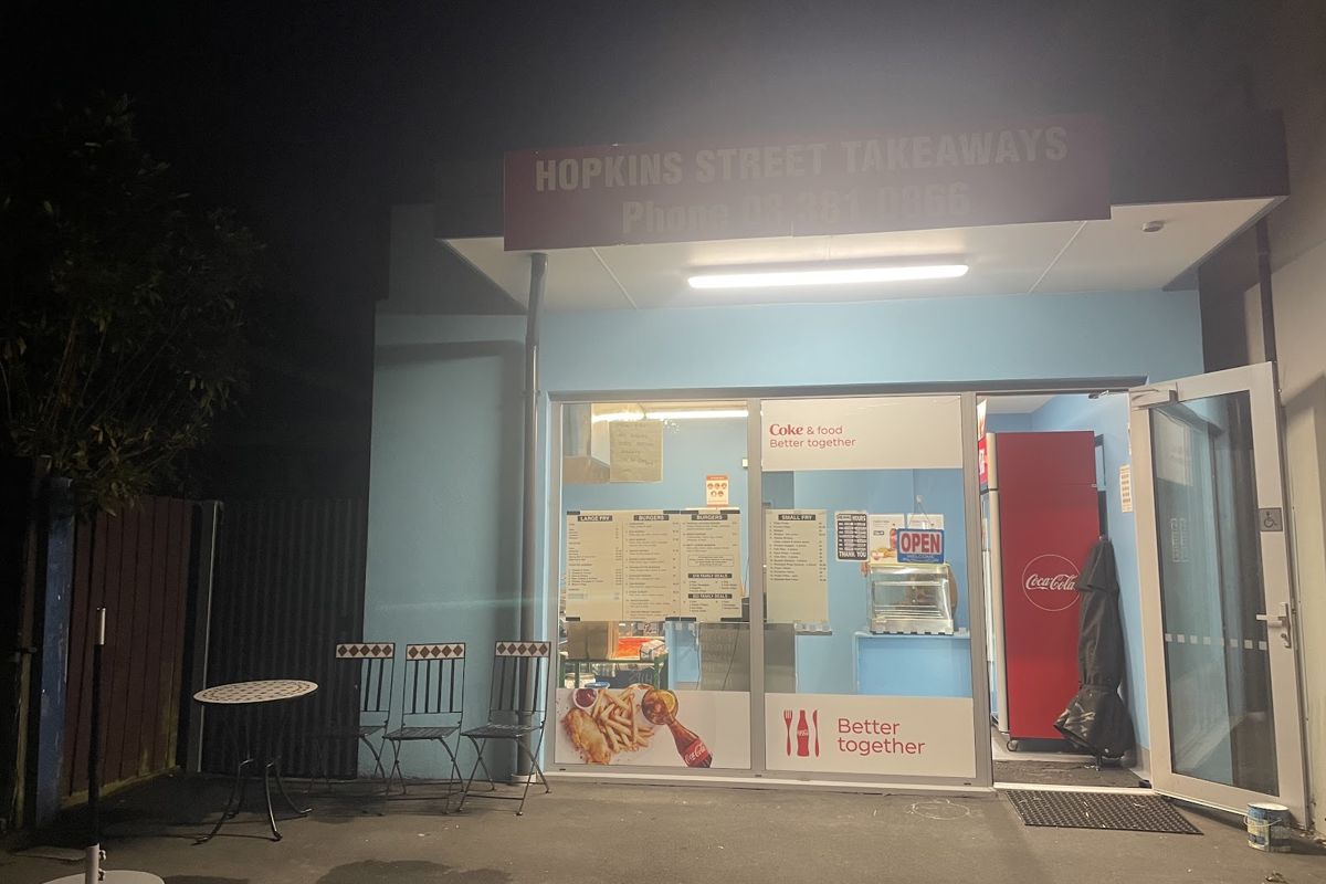Hopkins Street Takeaway shop front at night, Woolston
